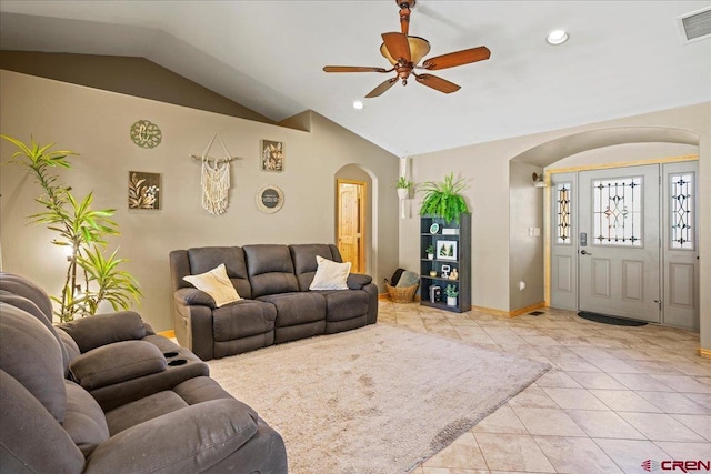 2224 American Way, Montrose, CO 81401 - living area with arched walkways, vaulted ceiling, a ceiling fan, light tile patterned flooring, and recessed lighting