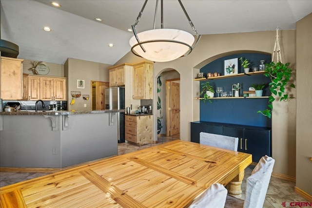2224 American Way, Montrose, CO 81401 - dining area with arched walkways, lofted ceiling, and recessed lighting