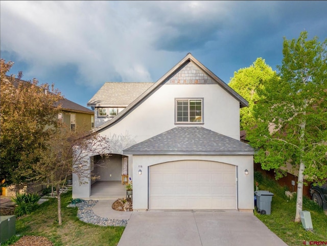416 Amy Way, Ridgway, CO 81432 - view of front of house featuring roof with shingles, stucco siding, driveway, and a front yard