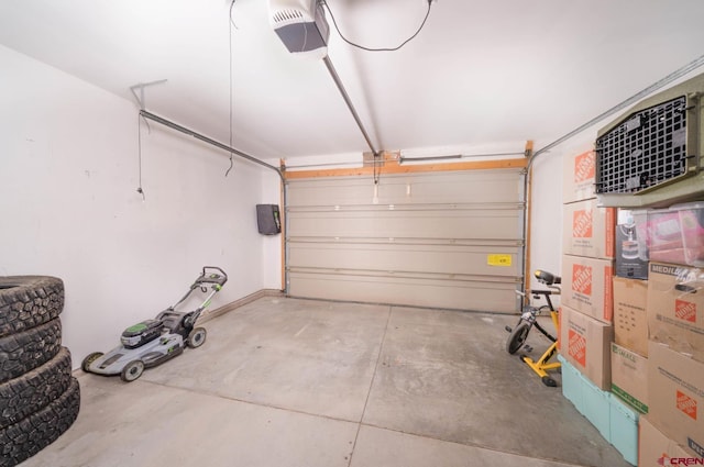 416 Amy Way, Ridgway, CO 81432 - garage featuring a garage door opener