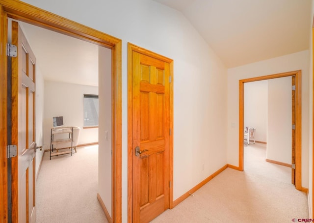 416 Amy Way, Ridgway, CO 81432 - hall featuring light colored carpet, vaulted ceiling, and baseboards