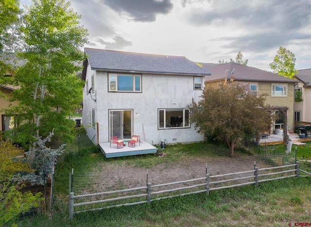 416 Amy Way, Ridgway, CO 81432 - back of property with a wooden deck, roof with shingles, and stucco siding