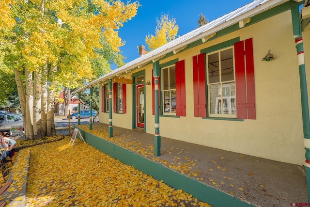 418 Elk Ave, Crested Butte, CO 81224 - view of side of property featuring stucco siding