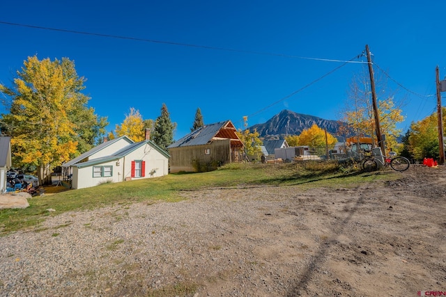 418 Elk Ave, Crested Butte, CO 81224 - view of grassy yard with a mountain view