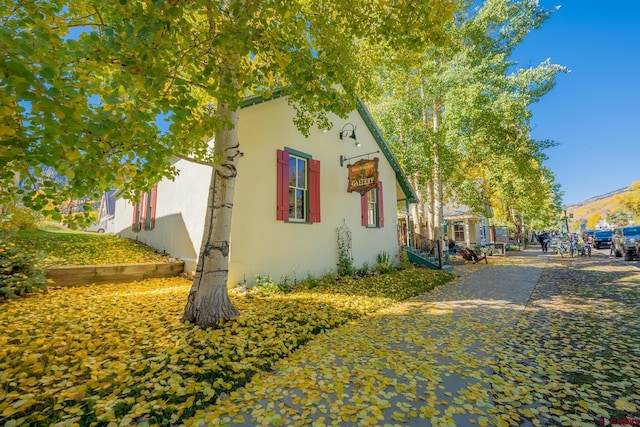 418 Elk Ave, Crested Butte, CO 81224 - view of side of home with stucco siding