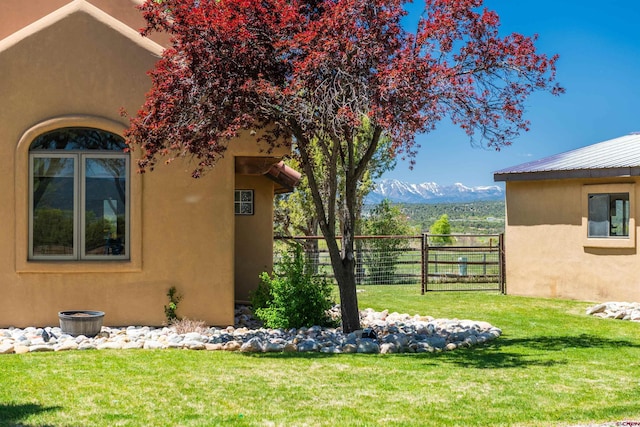 650 County Road 520, Bayfield, CO 81122 - view of side of home with stucco siding and a mountain view