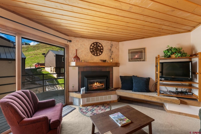 15 Marcellina Ln # 120, Mount Crested Butte, CO 81225 - carpeted living area featuring wooden ceiling and a tiled fireplace