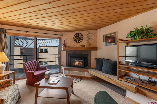 15 Marcellina Ln # 120, Mount Crested Butte, CO 81225 - living room featuring wood ceiling, carpet flooring, and a fireplace
