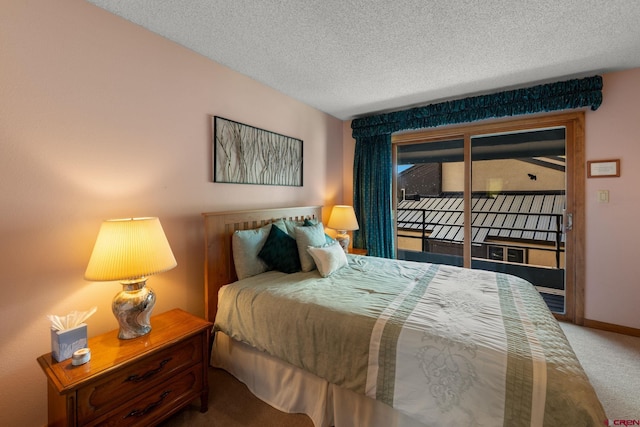 15 Marcellina Ln # 120, Mount Crested Butte, CO 81225 - bedroom with access to outside, carpet flooring, a textured ceiling, and baseboards