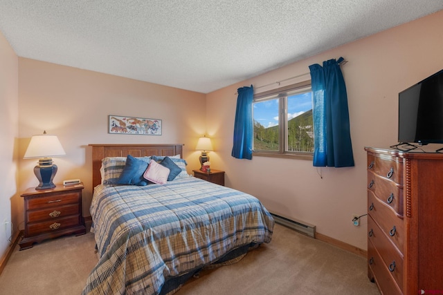 15 Marcellina Ln # 120, Mount Crested Butte, CO 81225 - bedroom with a baseboard heating unit, light colored carpet, baseboards, and a textured ceiling