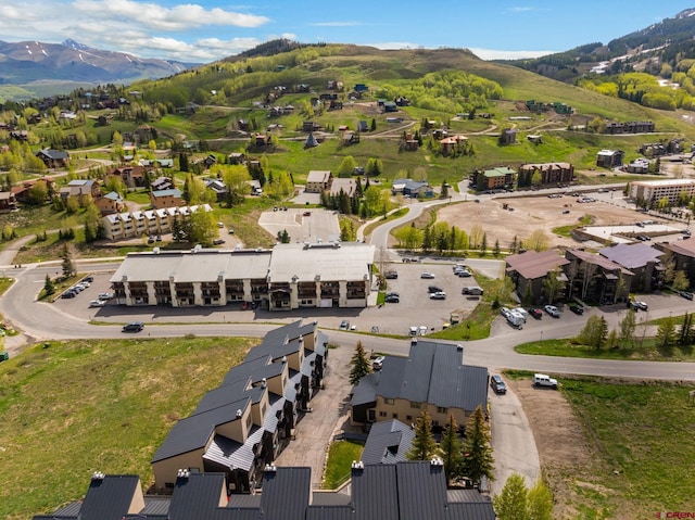 15 Marcellina Ln # 120, Mount Crested Butte, CO 81225 - aerial view of property and surrounding area with mountains