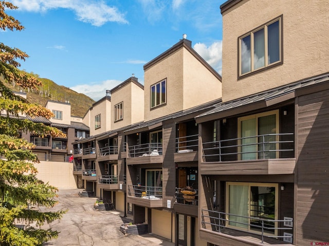 15 Marcellina Ln # 120, Mount Crested Butte, CO 81225 - view of building exterior with a mountain view