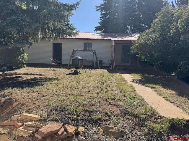 1010 N Dove St, Dove Creek, CO 81324 - back of property with metal roof