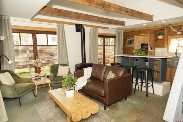 103 W 10 1/2 St, Creede, CO 81130 - living area with finished concrete floors, a wood stove, and recessed lighting