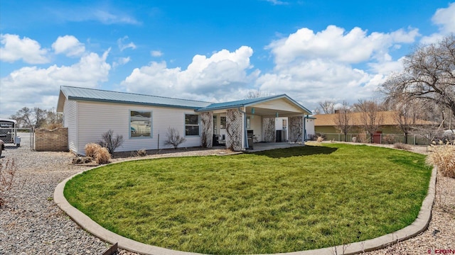 180 SE Frontier Ave, Cedaredge, CO 81413 - rear view of house with metal roof