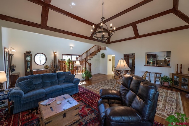 101 E Silver Sage Dr, Crested Butte, CO 81224 - living area with a chandelier, high vaulted ceiling, wood finished floors, beam ceiling, and stairs