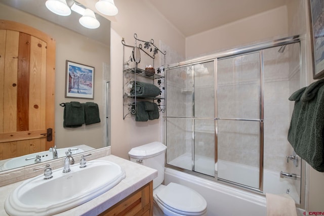 536 Journeys End Rd, Crested Butte, CO 81224 - full bathroom with toilet, vanity, and combined bath / shower with glass door