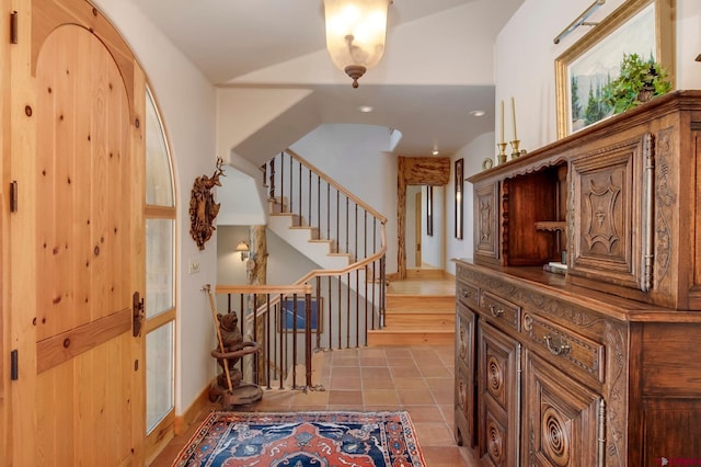 536 Journeys End Rd, Crested Butte, CO 81224 - foyer with light tile patterned floors, stairway, and recessed lighting