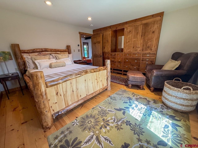 414 Maroon Ave, Crested Butte, CO 81224 - bedroom with light wood-style flooring and recessed lighting
