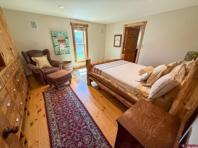 414 Maroon Ave, Crested Butte, CO 81224 - bedroom with hardwood / wood-style flooring and recessed lighting