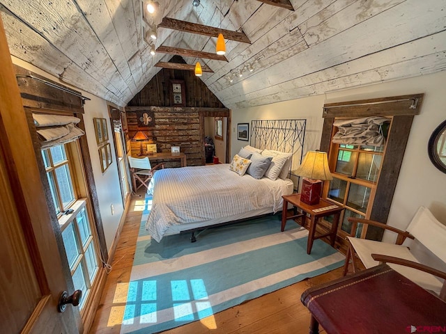 414 Maroon Ave, Crested Butte, CO 81224 - bedroom with hardwood / wood-style floors, vaulted ceiling, and wood ceiling