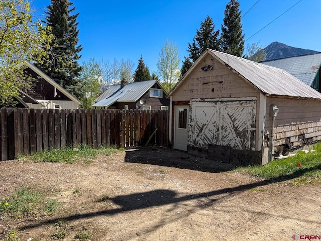 414 Maroon Ave, Crested Butte, CO 81224 - garage featuring a storage unit