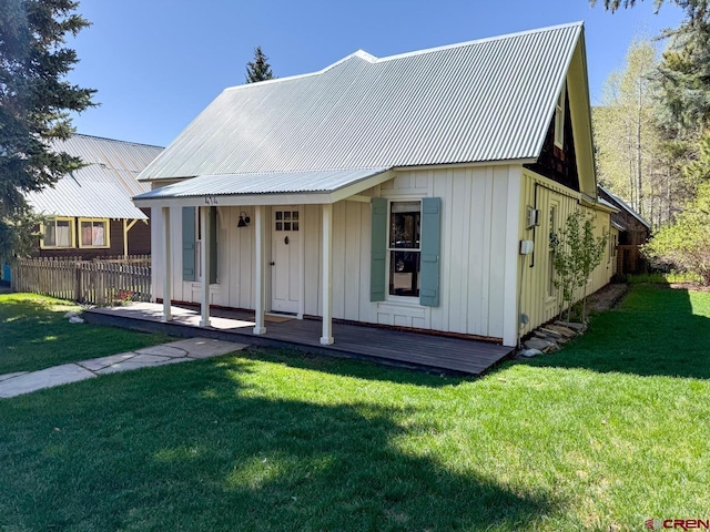 414 Maroon Ave, Crested Butte, CO 81224 - view of front facade with board and batten siding and metal roof