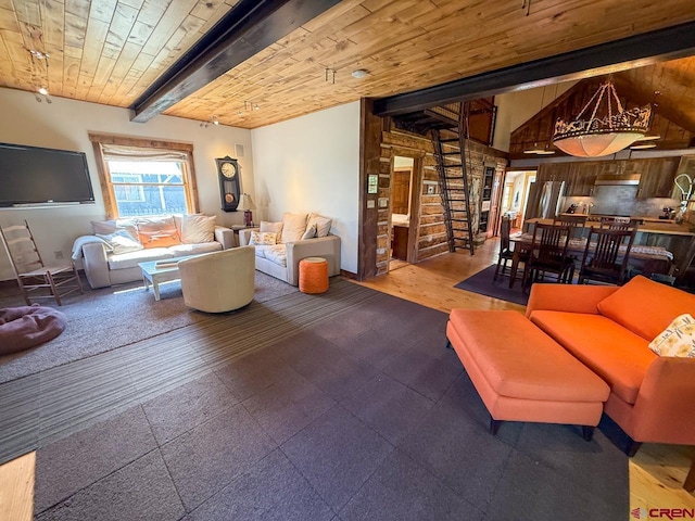 414 Maroon Ave, Crested Butte, CO 81224 - living room with wooden ceiling with exposed beams, wood finished floors, and ornate columns