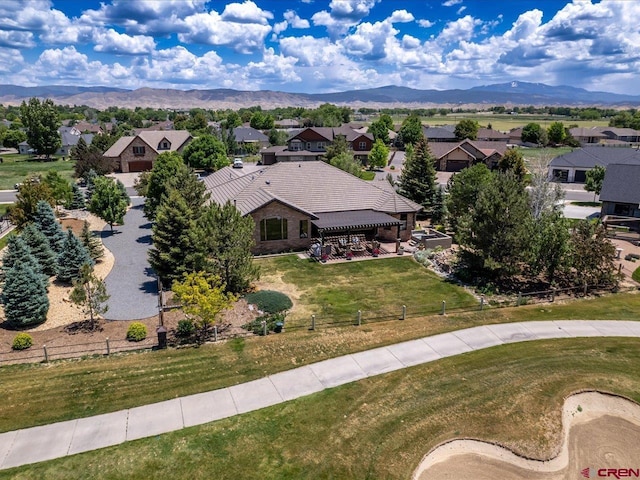 2691 Red Cliff Cir, Montrose, CO 81401 - aerial perspective of suburban area with a mountainous background