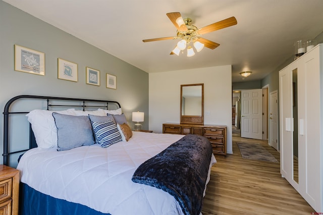 311 Falcon Dr, Pagosa Springs, CO 81147 - bedroom with wood finished floors and a ceiling fan