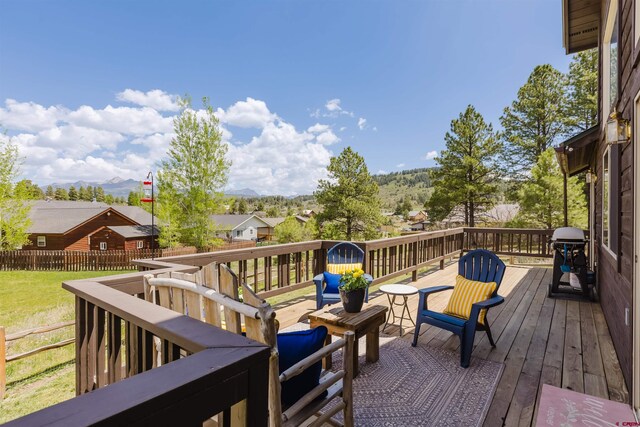 311 Falcon Dr, Pagosa Springs, CO 81147 - deck with area for grilling, a mountain view, and a residential view