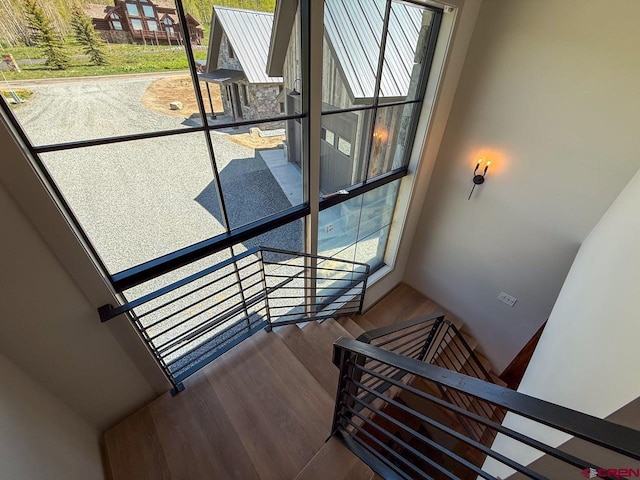 470 Meadow Dr, Crested Butte, CO 81224 - stairway featuring plenty of natural light and wood finished floors
