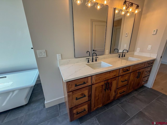 470 Meadow Dr, Crested Butte, CO 81224 - full bath featuring double vanity, a soaking tub, baseboards, and tile patterned floors