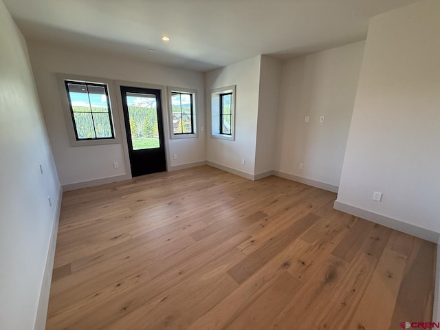 470 Meadow Dr, Crested Butte, CO 81224 - foyer entrance featuring light wood-style flooring, baseboards, and recessed lighting