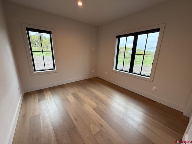 470 Meadow Dr, Crested Butte, CO 81224 - unfurnished room with light wood finished floors and baseboards