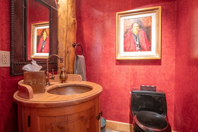 42 Gold Link Dr, Mount Crested Butte, CO 81225 - bathroom featuring vanity and wallpapered walls
