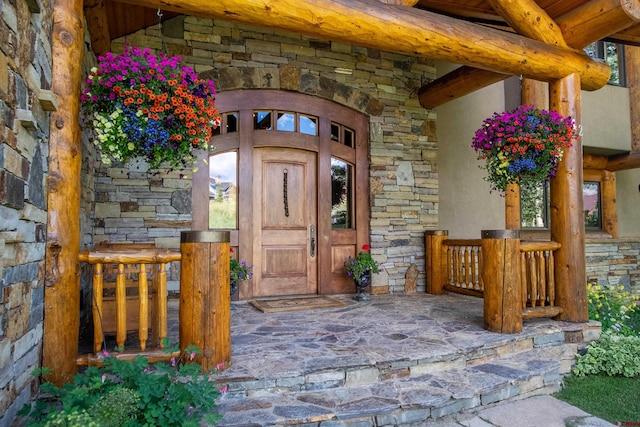 42 Gold Link Dr, Mount Crested Butte, CO 81225 - view of exterior entry with stone siding
