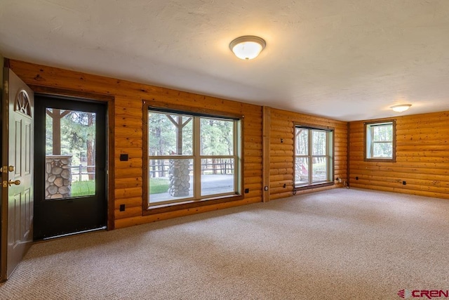 30 Stagecoach Rd, Bayfield, CO 81122 - entrance foyer with log walls and carpet floors