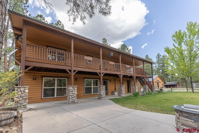 30 Stagecoach Rd, Bayfield, CO 81122 - back of house with a patio area, log veneer siding, and stairway