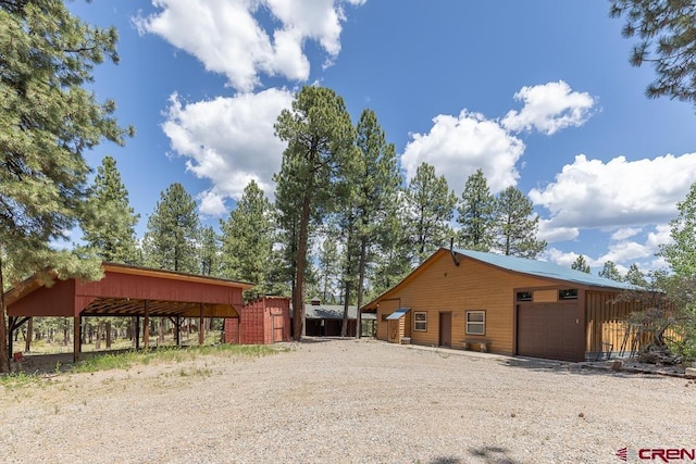 30 Stagecoach Rd, Bayfield, CO 81122 - view of home's exterior featuring a garage