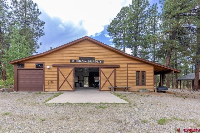 30 Stagecoach Rd, Bayfield, CO 81122 - view of front of home with an outbuilding and a garage