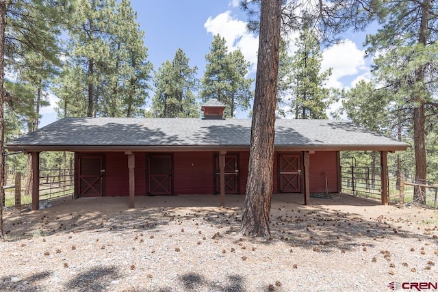 30 Stagecoach Rd, Bayfield, CO 81122 - view of front of property featuring an exterior structure, an outdoor structure, and roof with shingles