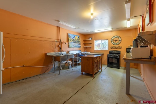 30 Stagecoach Rd, Bayfield, CO 81122 - office featuring concrete flooring and a wood stove