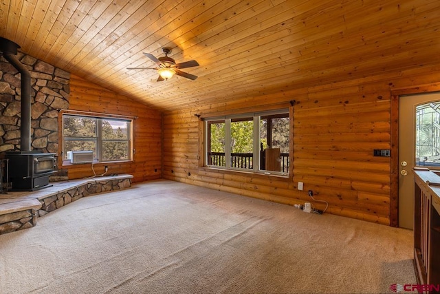 30 Stagecoach Rd, Bayfield, CO 81122 - unfurnished living room featuring wood ceiling, carpet flooring, a wood stove, vaulted ceiling, and ceiling fan