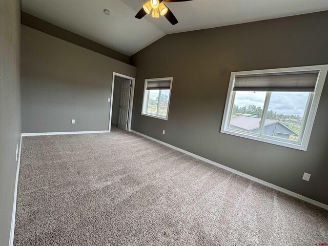 445 Saddle Cir, Pagosa Springs, CO 81147 - unfurnished room featuring a ceiling fan, lofted ceiling, carpet flooring, and baseboards