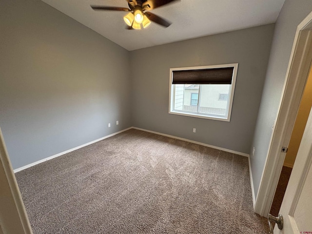445 Saddle Cir, Pagosa Springs, CO 81147 - spare room with carpet, ceiling fan, and baseboards
