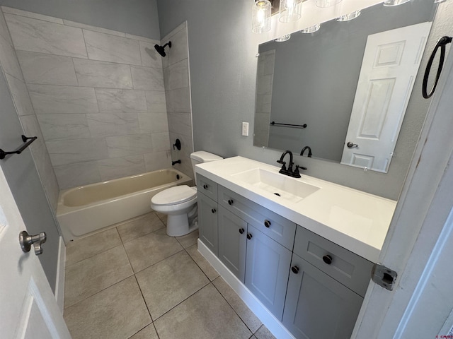 445 Saddle Cir, Pagosa Springs, CO 81147 - bathroom featuring vanity, toilet, tub / shower combination, and tile patterned flooring