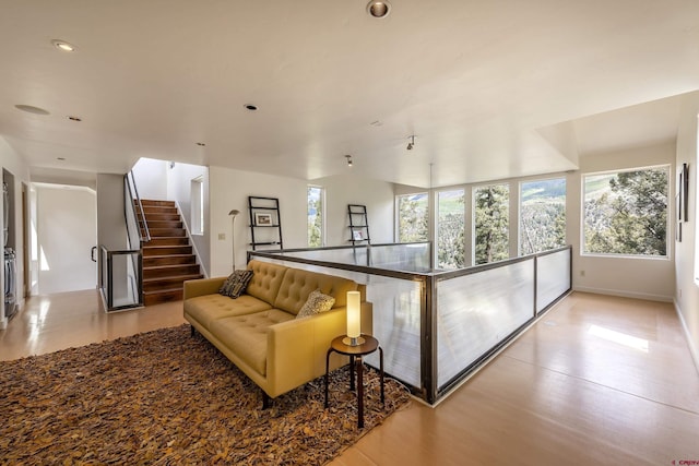 123 Boulders Way, Mountain Village, CO 81435 - living room with recessed lighting, light wood-style flooring, stairway, and baseboards