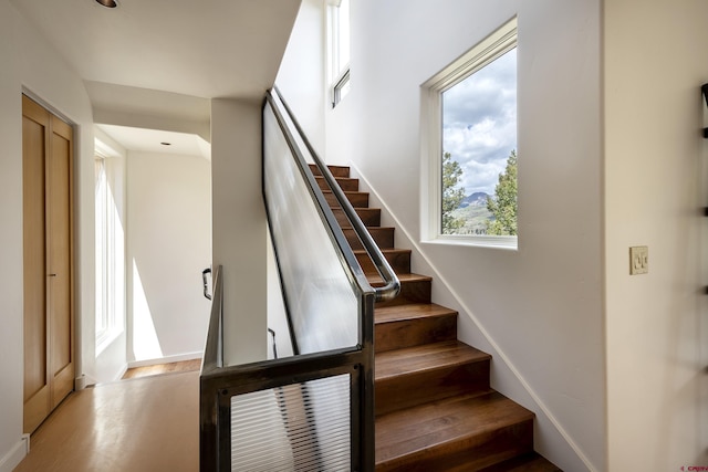 123 Boulders Way, Mountain Village, CO 81435 - stairway with wood finished floors and baseboards
