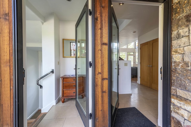 123 Boulders Way, Mountain Village, CO 81435 - corridor featuring light tile patterned floors and baseboards